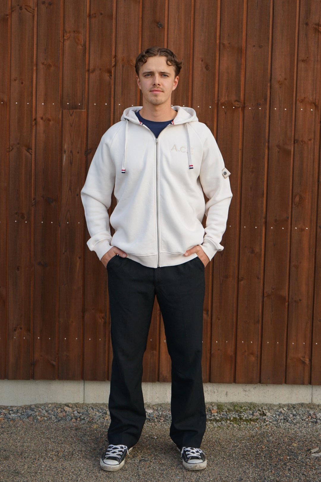 A regular sized White sand zip hoodie, Regular fit, Super Soft, Badge on left sleeve